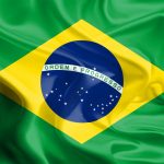 Det brasilianske flag på en bølget baggrund